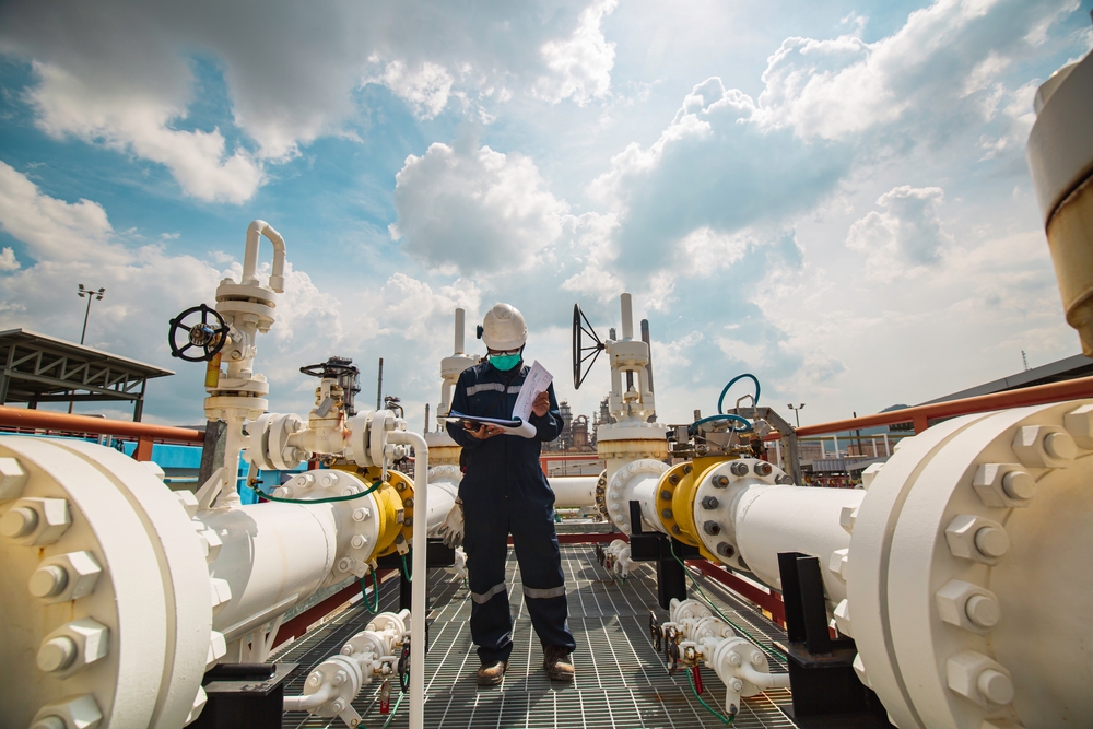 Male,Worker,Inspection,At,Steel,Long,Pipes,And,Pipe,Elbow